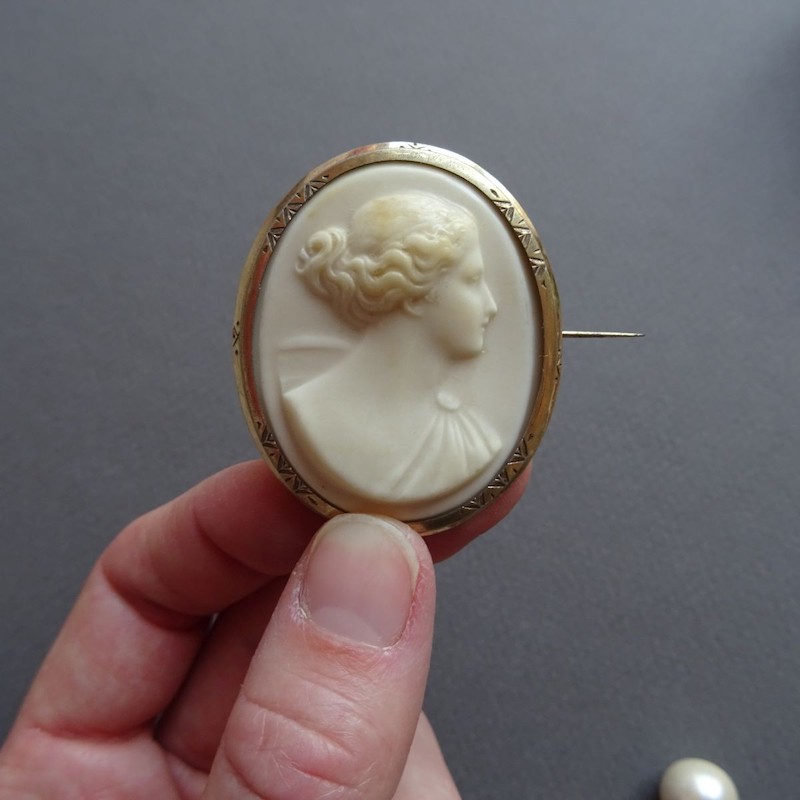 ivory coin brooch