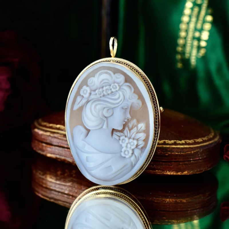 ivory coins brooch