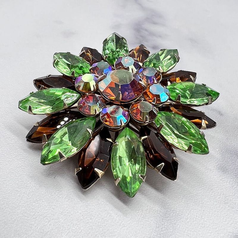 green brooch